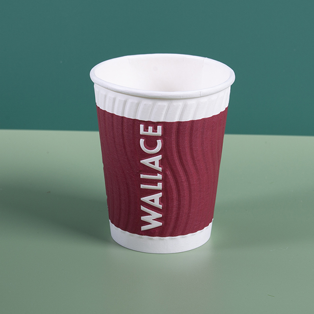 Embossed paper cup